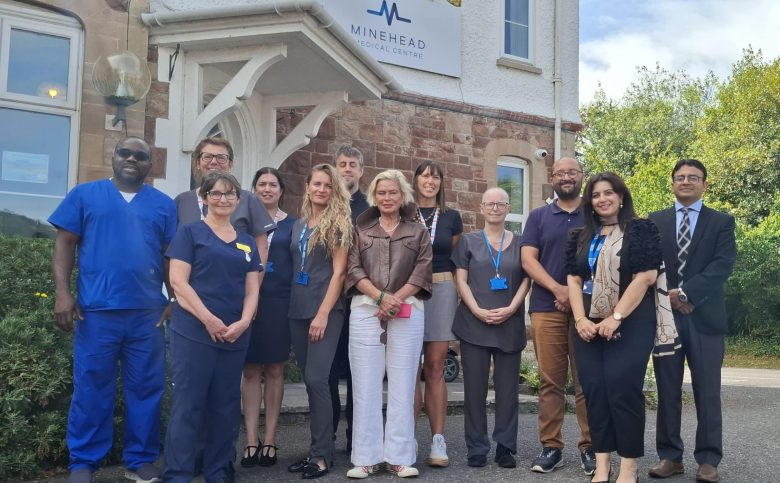 Minehead Medical Centre Team, ICB Team and Rachel Gilmour MP gather outside Minehead Medical Centre.